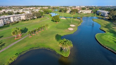 Discover resplendent living at the serene 2802 Victoria Way K4 on Wynmoor Golf Course in Florida - for sale on GolfHomes.com, golf home, golf lot