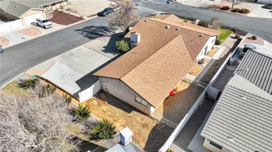 Welcome to this charming 3-bedroom, 2-bathroom corner-lot home on Spring Valley Lake Country Club in California - for sale on GolfHomes.com, golf home, golf lot