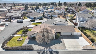 Welcome to this charming 3-bedroom, 2-bathroom corner-lot home on Spring Valley Lake Country Club in California - for sale on GolfHomes.com, golf home, golf lot