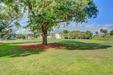 Discover resplendent living at the serene 2802 Victoria Way K4 on Wynmoor Golf Course in Florida - for sale on GolfHomes.com, golf home, golf lot