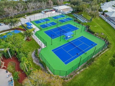 Absolutely Beautiful & stylish LAKEFRONT Divosta built home on Monarch Country Club in Florida - for sale on GolfHomes.com, golf home, golf lot