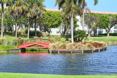 Discover resplendent living at the serene 2802 Victoria Way K4 on Wynmoor Golf Course in Florida - for sale on GolfHomes.com, golf home, golf lot