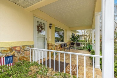 This charming, freshly painted Philadelphia home is nestled in on On Top of the World Golf Course in Florida - for sale on GolfHomes.com, golf home, golf lot