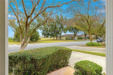 This charming, freshly painted Philadelphia home is nestled in on On Top of the World Golf Course in Florida - for sale on GolfHomes.com, golf home, golf lot