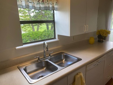 Enjoy the Florida lifestyle in this furnished mobile home in on Spanish Lakes Fairways in Florida - for sale on GolfHomes.com, golf home, golf lot