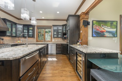 Experience refined golf living in this custom-built home located on Reynolds Lake Oconee - The Oconee in Georgia - for sale on GolfHomes.com, golf home, golf lot