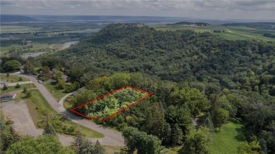 This stunning lot offers a level building site, just across from on Coffee Mill Golf and Country Club in Minnesota - for sale on GolfHomes.com, golf home, golf lot