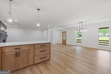 Beautifully Renovated Ranch Home with Fully Finished Basement on Lanier Island Legacy Golf Couorse in Georgia - for sale on GolfHomes.com, golf home, golf lot
