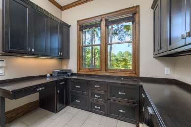Experience refined golf living in this custom-built home located on Reynolds Lake Oconee - The Oconee in Georgia - for sale on GolfHomes.com, golf home, golf lot