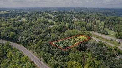 This stunning lot offers a level building site, just across from on Coffee Mill Golf and Country Club in Minnesota - for sale on GolfHomes.com, golf home, golf lot