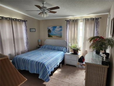 2 Bed  2 Bath  Fully Furnished , Fixtures with Golf Cart and on Lakes of Lady Lake Golf Course in Florida - for sale on GolfHomes.com, golf home, golf lot