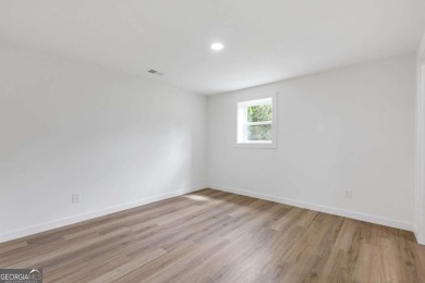 Beautifully Renovated Ranch Home with Fully Finished Basement on Lanier Island Legacy Golf Couorse in Georgia - for sale on GolfHomes.com, golf home, golf lot