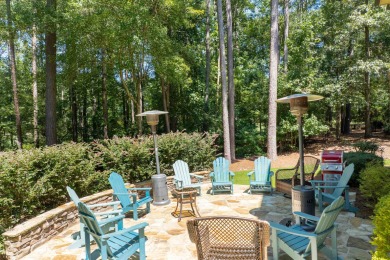 Experience refined golf living in this custom-built home located on Reynolds Lake Oconee - The Oconee in Georgia - for sale on GolfHomes.com, golf home, golf lot