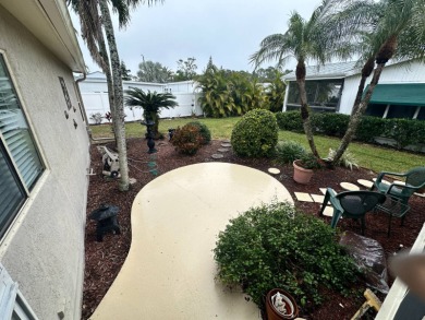 Beautiful stucco home on the exterior perimeter.  Updated on Del Tura Golf and Country Club in Florida - for sale on GolfHomes.com, golf home, golf lot