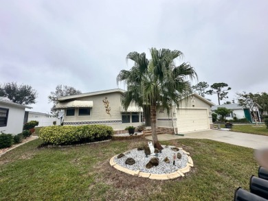 Beautiful stucco home on the exterior perimeter.  Updated on Del Tura Golf and Country Club in Florida - for sale on GolfHomes.com, golf home, golf lot