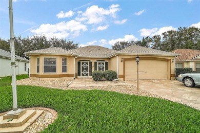 Come see this 3/2 Block & Stucco Designer Home on the 7th hole on Hacienda Hills Golf and Country Club in Florida - for sale on GolfHomes.com, golf home, golf lot