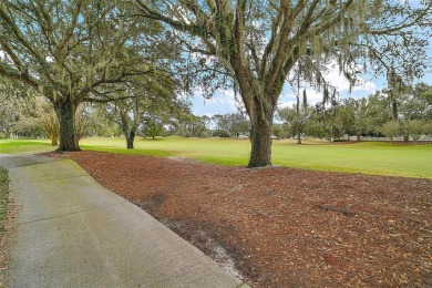 Come see this 3/2 Block & Stucco Designer Home on the 7th hole on Hacienda Hills Golf and Country Club in Florida - for sale on GolfHomes.com, golf home, golf lot