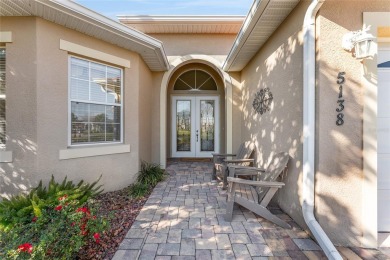 STUNNING WATER VIEWS and UPGRADES in abundance await you in this on Miona Lake Golf Club in Florida - for sale on GolfHomes.com, golf home, golf lot