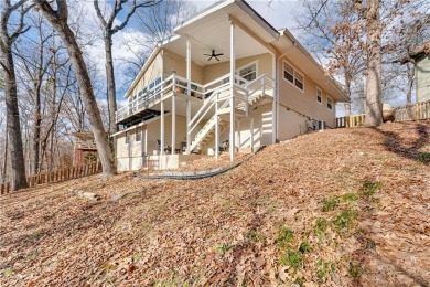 Nestled in a peaceful setting near Lake Windsor, this charming on Bella Vista Country Club - Berksdale in Arkansas - for sale on GolfHomes.com, golf home, golf lot