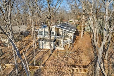 Nestled in a peaceful setting near Lake Windsor, this charming on Bella Vista Country Club - Berksdale in Arkansas - for sale on GolfHomes.com, golf home, golf lot