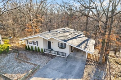 Nestled in a peaceful setting near Lake Windsor, this charming on Bella Vista Country Club - Berksdale in Arkansas - for sale on GolfHomes.com, golf home, golf lot