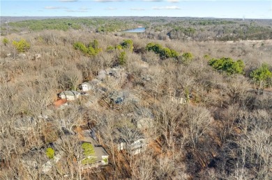 Nestled in a peaceful setting near Lake Windsor, this charming on Bella Vista Country Club - Berksdale in Arkansas - for sale on GolfHomes.com, golf home, golf lot