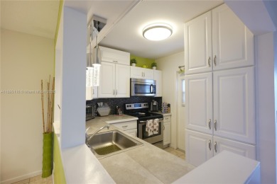 55+ COMMUNITY! Experience comfort and elegance in this fully on Lauderhill Golf Course in Florida - for sale on GolfHomes.com, golf home, golf lot
