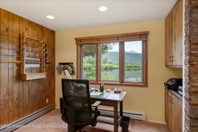 Rarely available and highly desirable ground floor pondside on Ranch at Roaring Fork Golf Course in Colorado - for sale on GolfHomes.com, golf home, golf lot