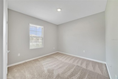 This charming 4-bedroom, 2-bathroom single-family home is on Highlands Reserve Golf Club in Florida - for sale on GolfHomes.com, golf home, golf lot
