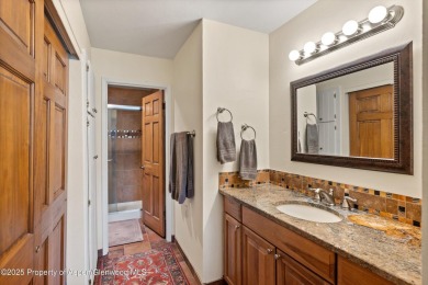 Rarely available and highly desirable ground floor pondside on Ranch at Roaring Fork Golf Course in Colorado - for sale on GolfHomes.com, golf home, golf lot