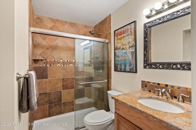 Rarely available and highly desirable ground floor pondside on Ranch at Roaring Fork Golf Course in Colorado - for sale on GolfHomes.com, golf home, golf lot