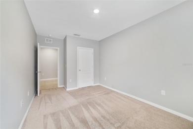 This charming 4-bedroom, 2-bathroom single-family home is on Highlands Reserve Golf Club in Florida - for sale on GolfHomes.com, golf home, golf lot