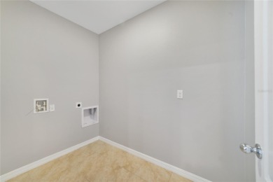 This charming 4-bedroom, 2-bathroom single-family home is on Highlands Reserve Golf Club in Florida - for sale on GolfHomes.com, golf home, golf lot