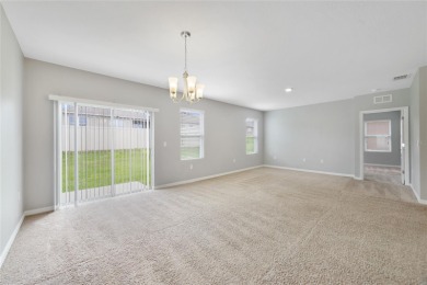 This charming 4-bedroom, 2-bathroom single-family home is on Highlands Reserve Golf Club in Florida - for sale on GolfHomes.com, golf home, golf lot