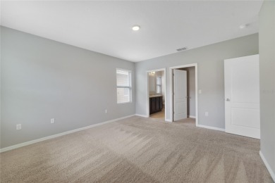 This charming 4-bedroom, 2-bathroom single-family home is on Highlands Reserve Golf Club in Florida - for sale on GolfHomes.com, golf home, golf lot