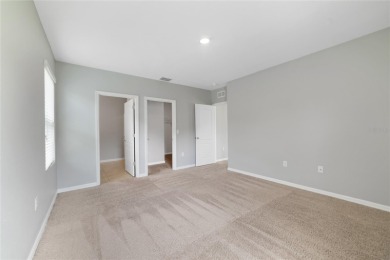 This charming 4-bedroom, 2-bathroom single-family home is on Highlands Reserve Golf Club in Florida - for sale on GolfHomes.com, golf home, golf lot
