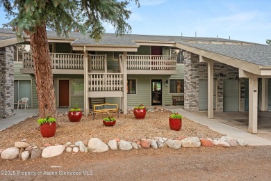 Rarely available and highly desirable ground floor pondside on Ranch at Roaring Fork Golf Course in Colorado - for sale on GolfHomes.com, golf home, golf lot