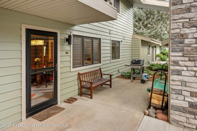 Rarely available and highly desirable ground floor pondside on Ranch at Roaring Fork Golf Course in Colorado - for sale on GolfHomes.com, golf home, golf lot