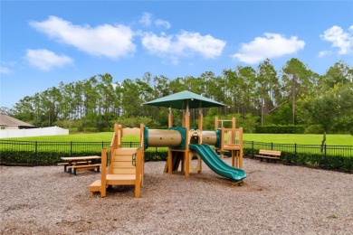 This charming 4-bedroom, 2-bathroom single-family home is on Highlands Reserve Golf Club in Florida - for sale on GolfHomes.com, golf home, golf lot