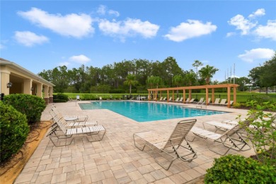 This charming 4-bedroom, 2-bathroom single-family home is on Highlands Reserve Golf Club in Florida - for sale on GolfHomes.com, golf home, golf lot