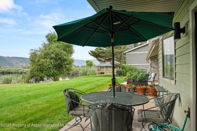 Rarely available and highly desirable ground floor pondside on Ranch at Roaring Fork Golf Course in Colorado - for sale on GolfHomes.com, golf home, golf lot