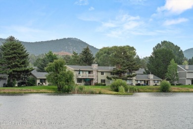 Rarely available and highly desirable ground floor pondside on Ranch at Roaring Fork Golf Course in Colorado - for sale on GolfHomes.com, golf home, golf lot