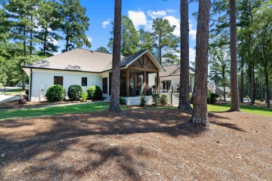 A completely reimagined residence that blends timeless charm on Reynolds Lake Oconee - The Landing in Georgia - for sale on GolfHomes.com, golf home, golf lot