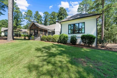 A completely reimagined residence that blends timeless charm on Reynolds Lake Oconee - The Landing in Georgia - for sale on GolfHomes.com, golf home, golf lot