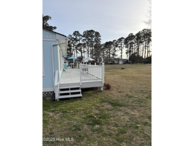 Home located near the Albemarle Sound with an extra building lot on Chowan Golf and Country Club in North Carolina - for sale on GolfHomes.com, golf home, golf lot