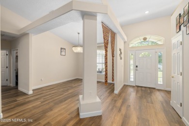 Beautiful Palm Coast Home! Spacious 3 bed, 2 bath home with 2 on The Grand Club - Pine Lakes Course in Florida - for sale on GolfHomes.com, golf home, golf lot