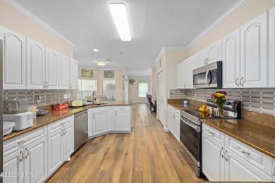 Beautiful Palm Coast Home! Spacious 3 bed, 2 bath home with 2 on The Grand Club - Pine Lakes Course in Florida - for sale on GolfHomes.com, golf home, golf lot