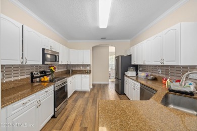 Beautiful Palm Coast Home! Spacious 3 bed, 2 bath home with 2 on The Grand Club - Pine Lakes Course in Florida - for sale on GolfHomes.com, golf home, golf lot