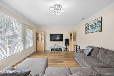 Beautiful Palm Coast Home! Spacious 3 bed, 2 bath home with 2 on The Grand Club - Pine Lakes Course in Florida - for sale on GolfHomes.com, golf home, golf lot