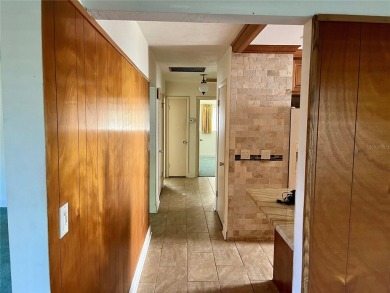 The property flooded twice last year and is being sold as its on Pasadena Yacht and Country Club in Florida - for sale on GolfHomes.com, golf home, golf lot